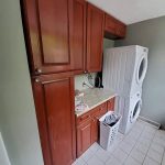 a laundry room with a washer and dryer.