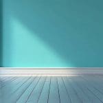 Smooth teal interior wall with a clean, glossy finish, showing an example of whether you can paint over glossy walls without sanding