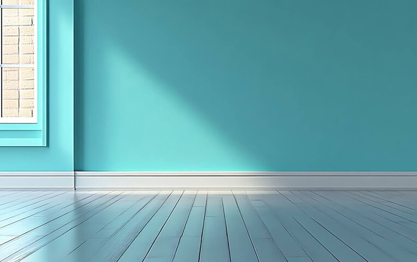 Smooth teal interior wall with a clean, glossy finish, showing an example of whether you can paint over glossy walls without sanding