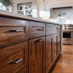 Kitchen cabinets showing how much cabinet refinishing costs compared to replacement with refinished wood cabinets and modern finishes