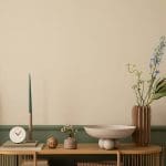 Interior living space styled with neutral tones, showing how to get your home ready for spring painting projects with clean walls and organized décor.