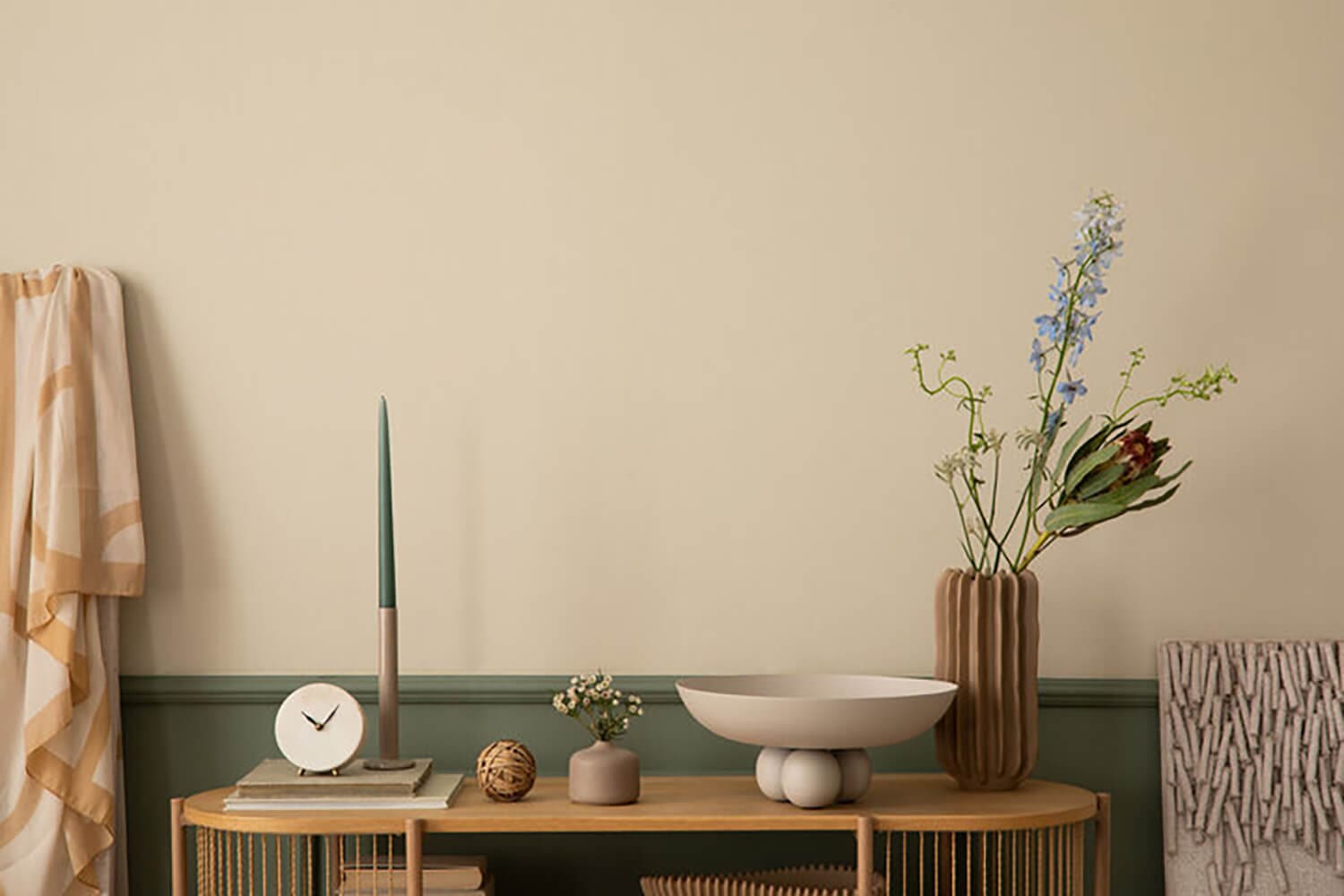 Interior living space styled with neutral tones, showing how to get your home ready for spring painting projects with clean walls and organized décor.